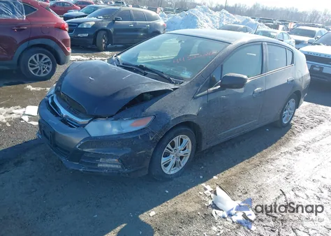 2013 Honda Insight z USA, uszkodzony, nr VIN JHMZE2H31DS006188